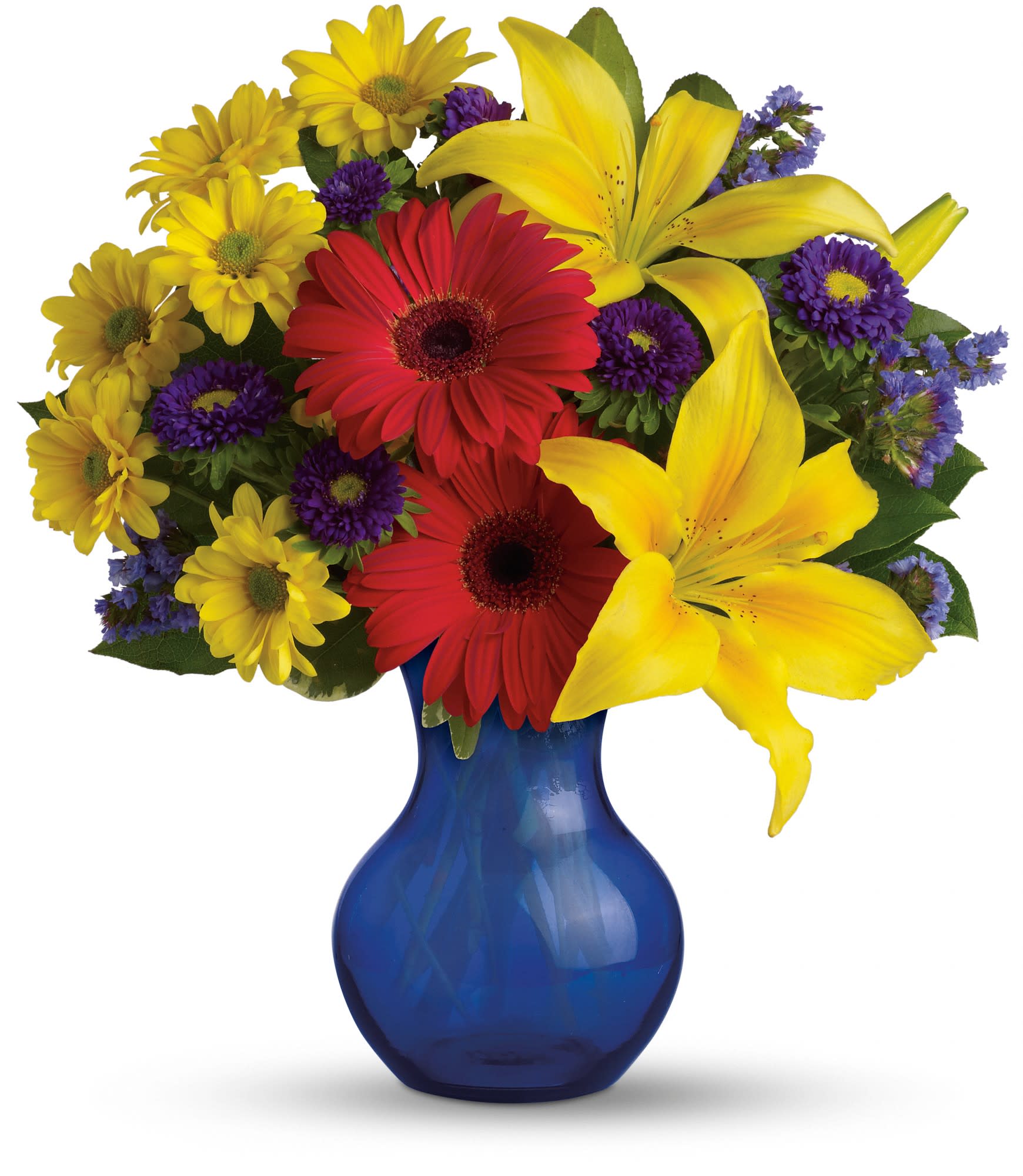 Summer Daydream Bouquet - Send them on a summer daydream with this sensationally sunny bouquet! These vivid blooms are arranged in a cobalt blue vase. 