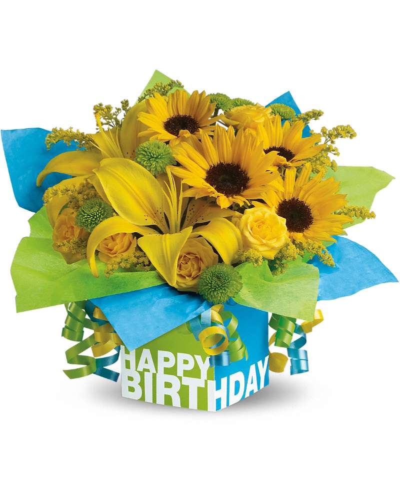 Yellow bouquet in a birthday gift box with ribbon curls
