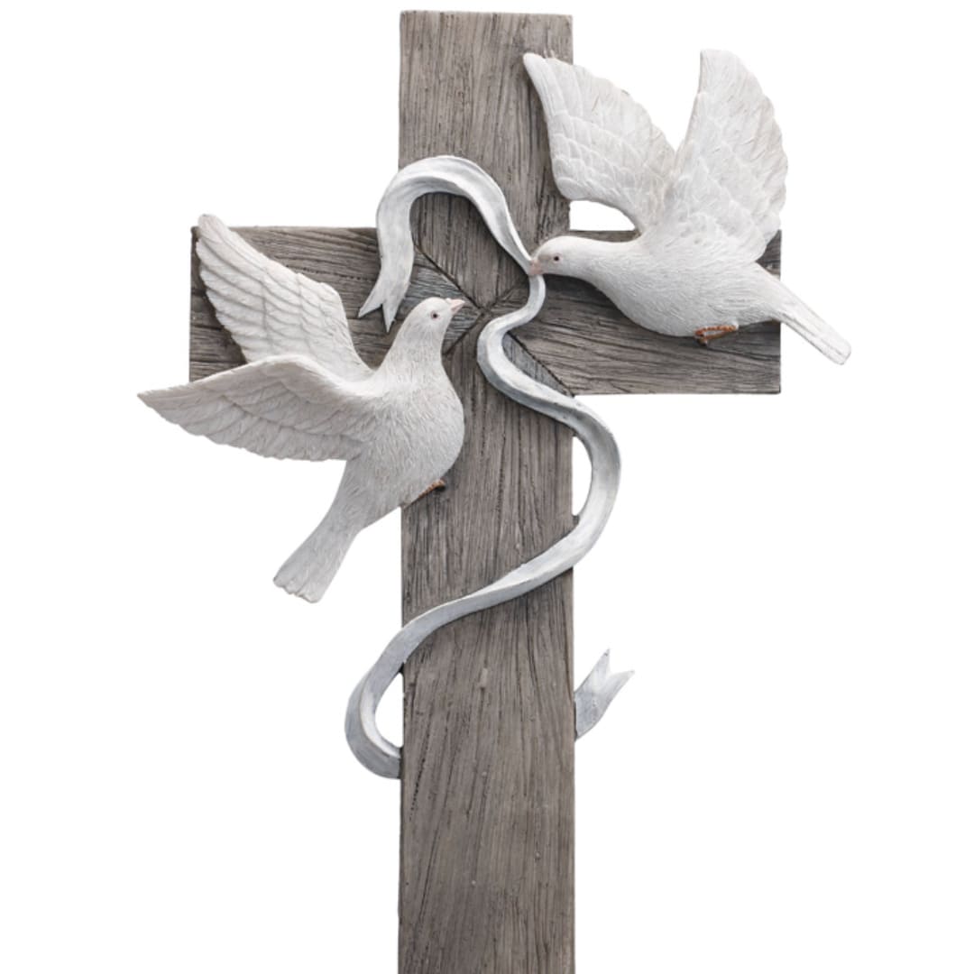 Wooden cross with two white doves and a silver ribbon