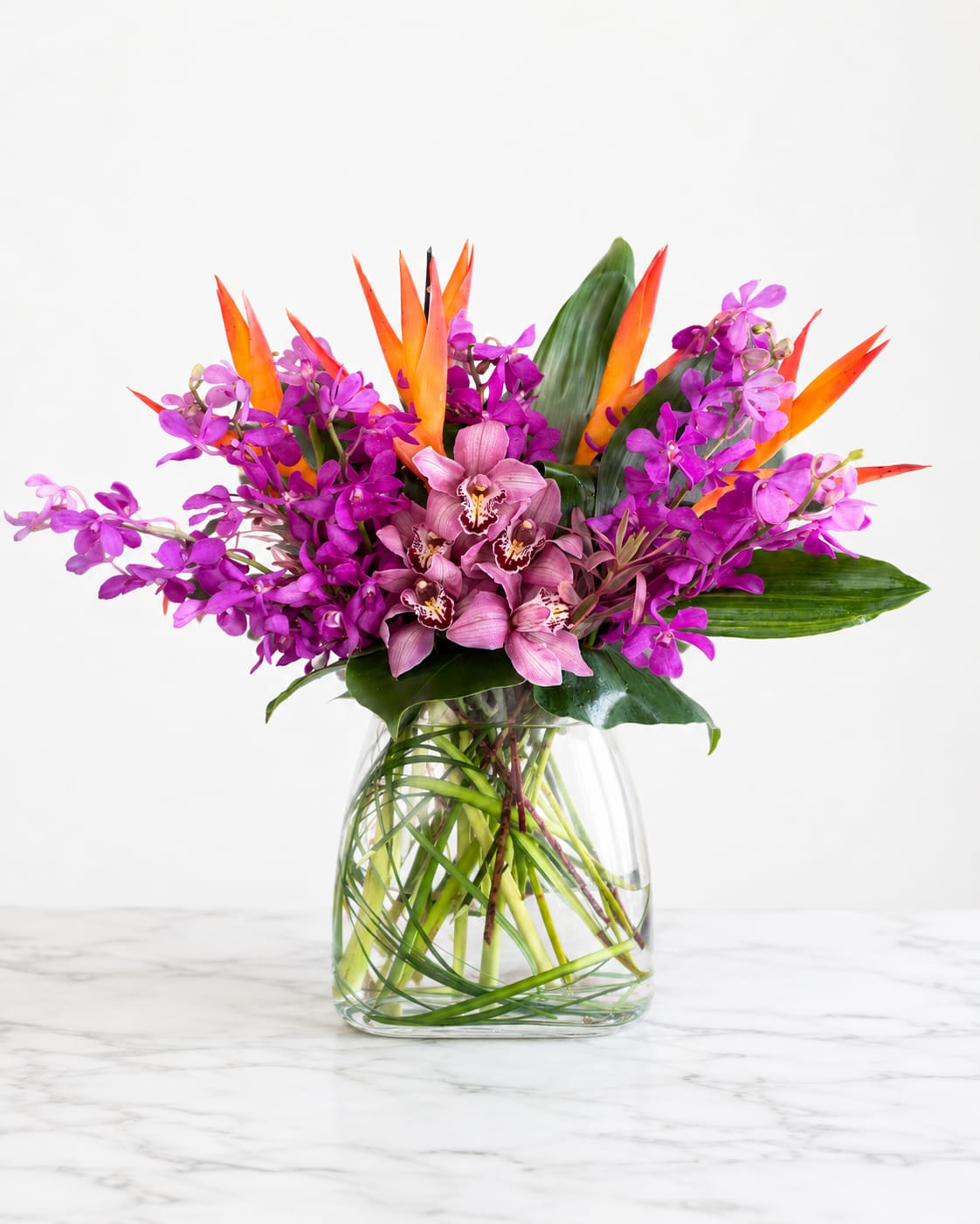 Hawaii - Tropical Flowers Orchids Ti Leaves and more - Varying assortments of orchids and other tropical blooms will give them a sense of paradise right at home.  