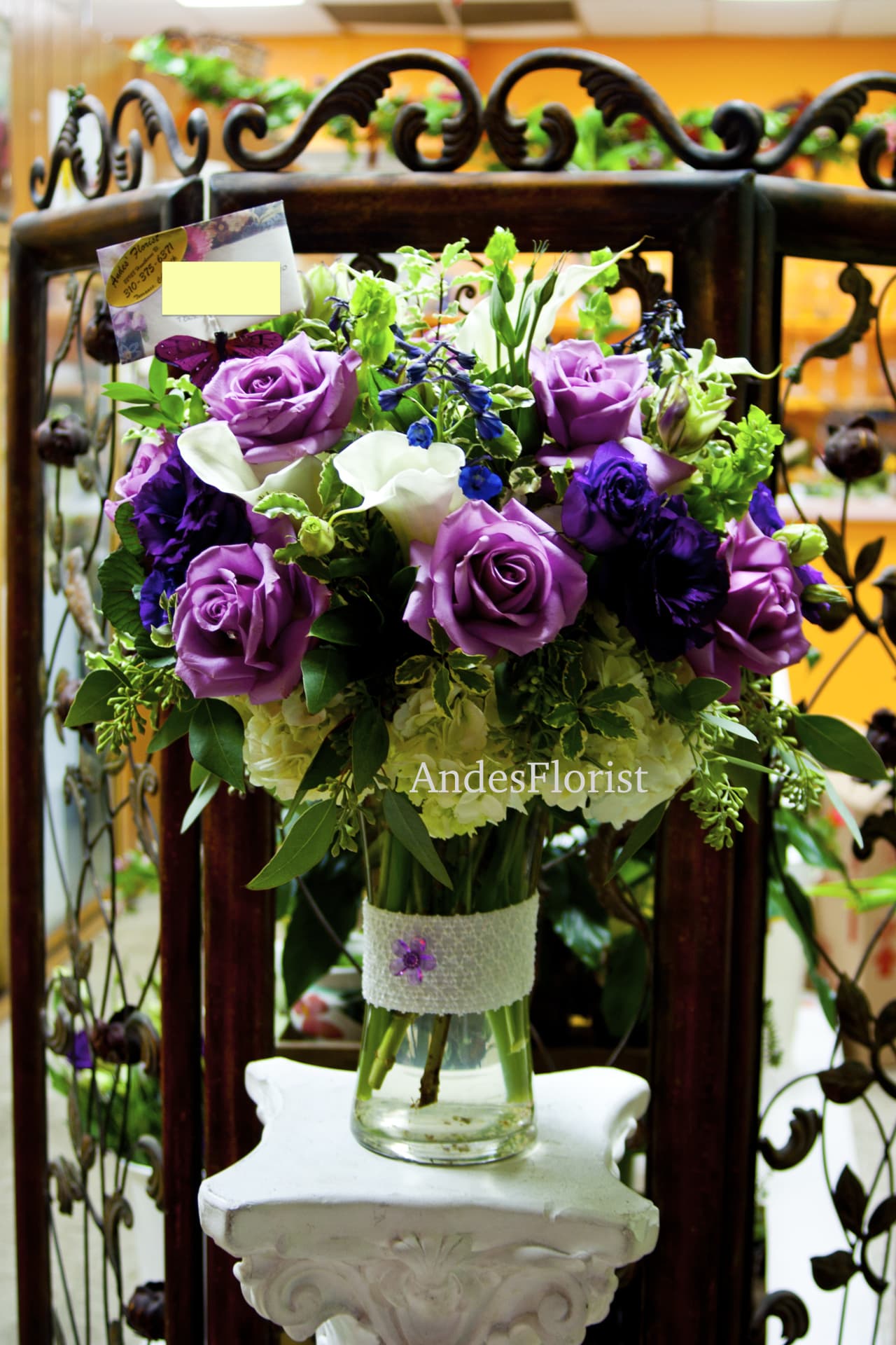 Jasmine - Lavender Roses, Calla Lillies, Mixed green and blue flowers - This beautiful abundance brings a sweet garden of lavender roses, purple lisianthus, delphinium, hydrangeas and much more to life. 