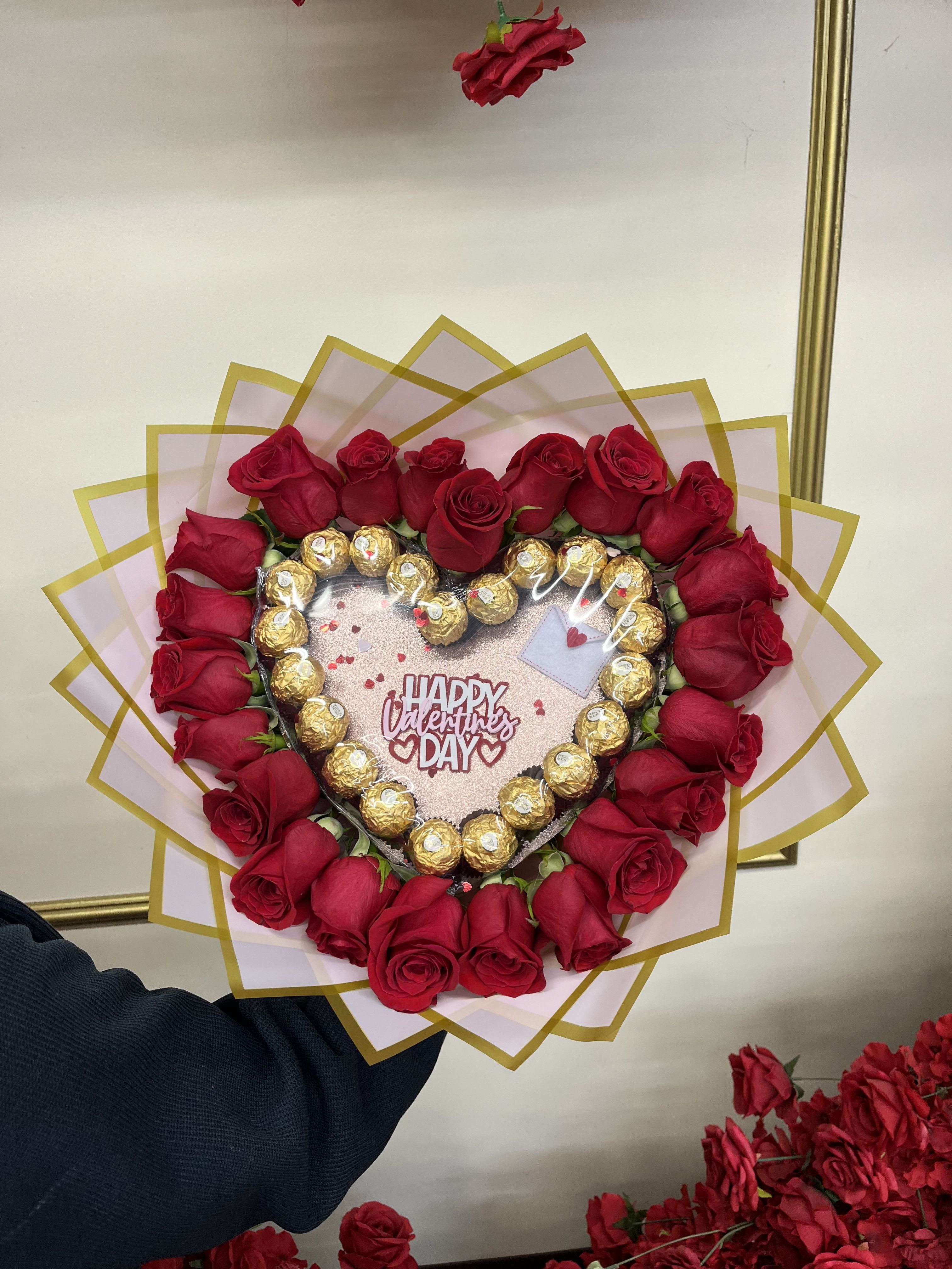 Heart-shaped rose bouquet with Ferrero Rocher chocolates and a Valentine card
