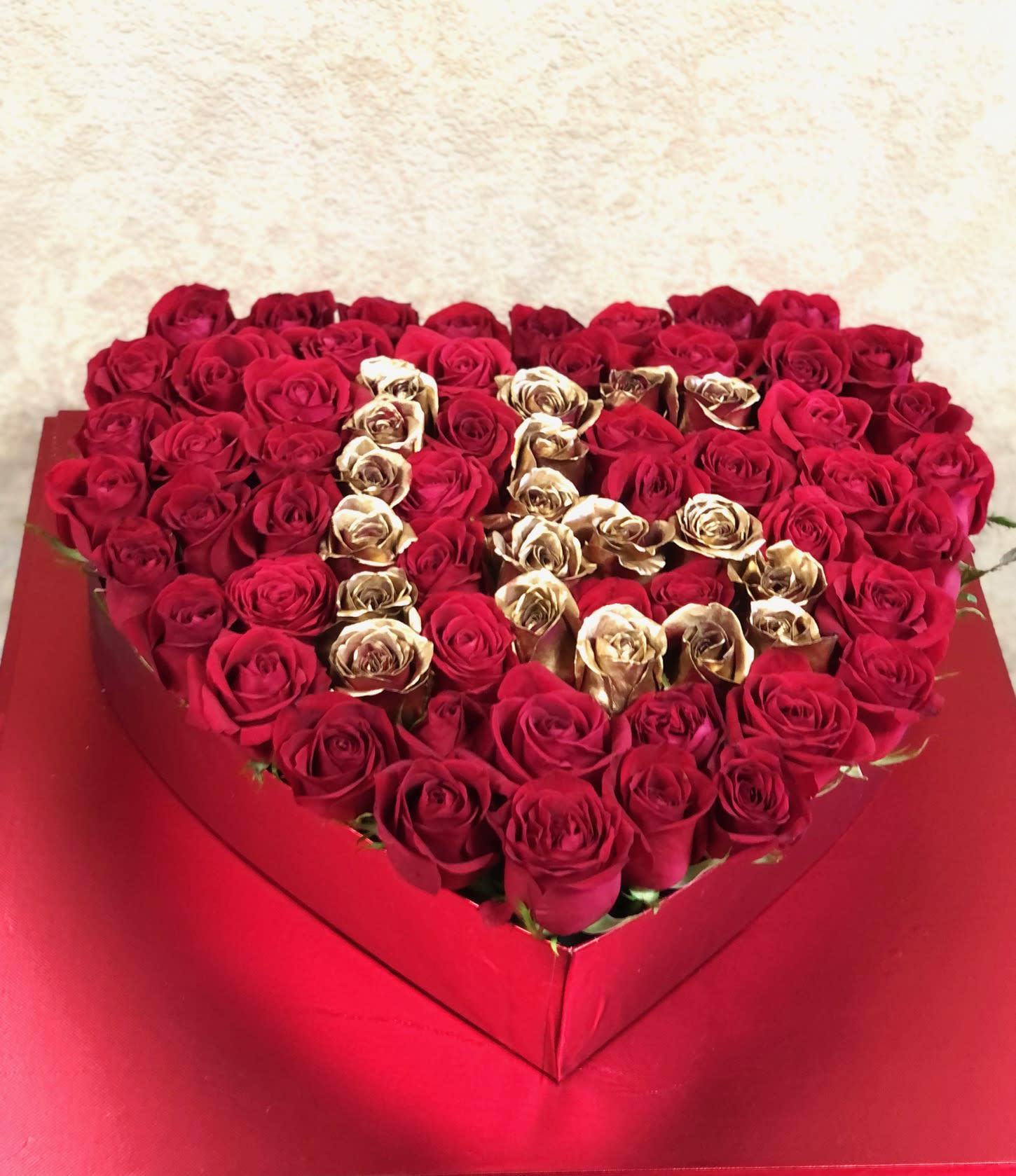 Milestone Heart Box  - ANNIVERSARY or BIRTHDAY Heart-shaped covered box with 60-75 roses.  Roses can be red, white, lavender, pink, or yellow.  Please write the choice of color and number for arrangement in the comments section.