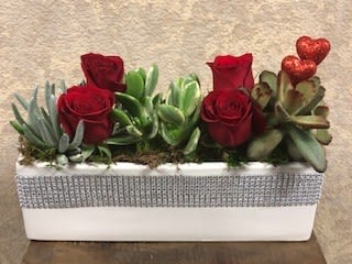 Garden of Love Succulent dish - Four red roses with succulents in a ceramic planter wrapped in crystals.