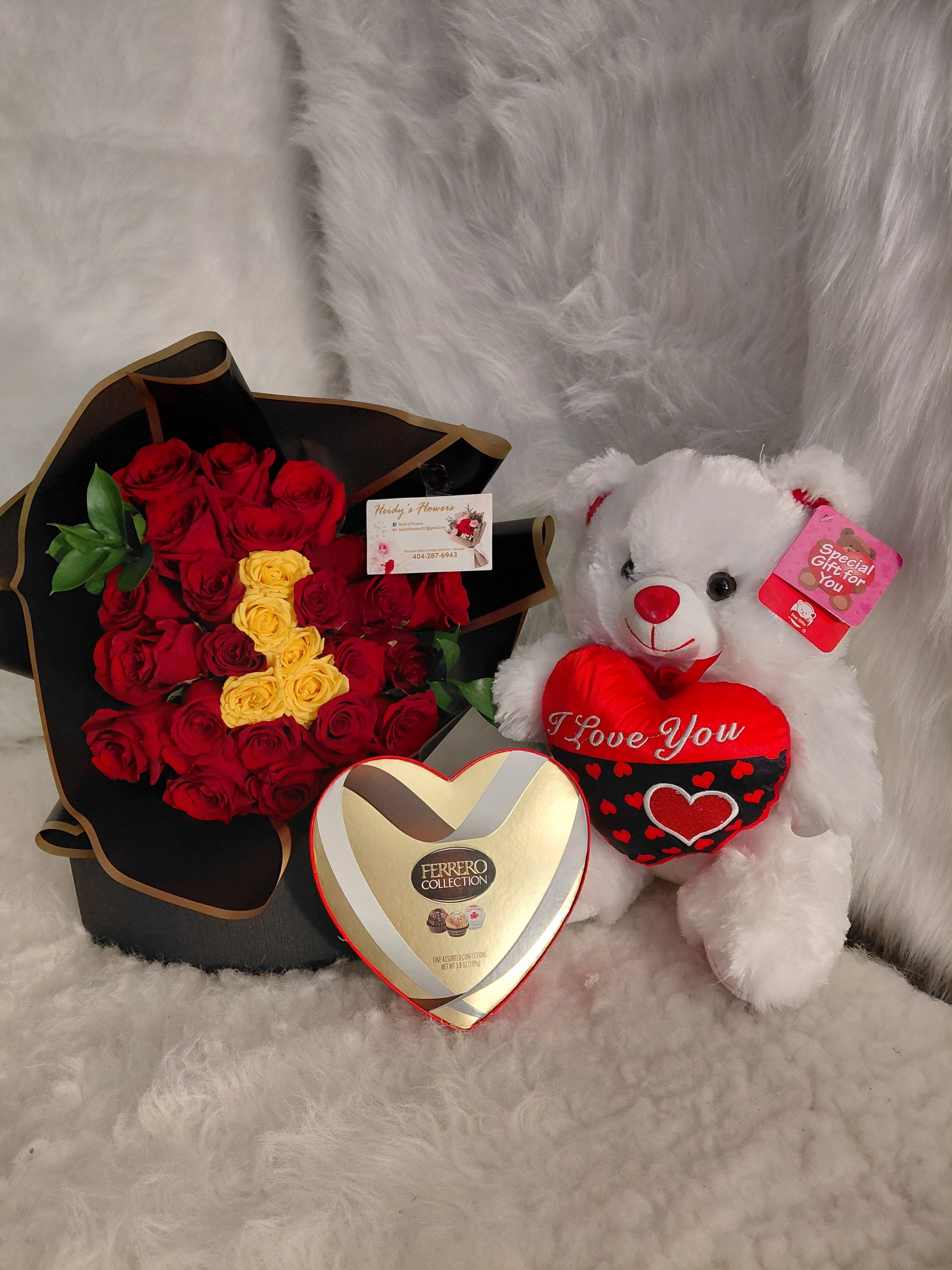 24 roses special bouquet. - Special bouquet. 24 roses whit 2 miny yellow roses. Red roses. A bouquet of red roses, daisies, delicious chocolates, and a cuddly plush toy that sings and lights up. A charming bouquet.