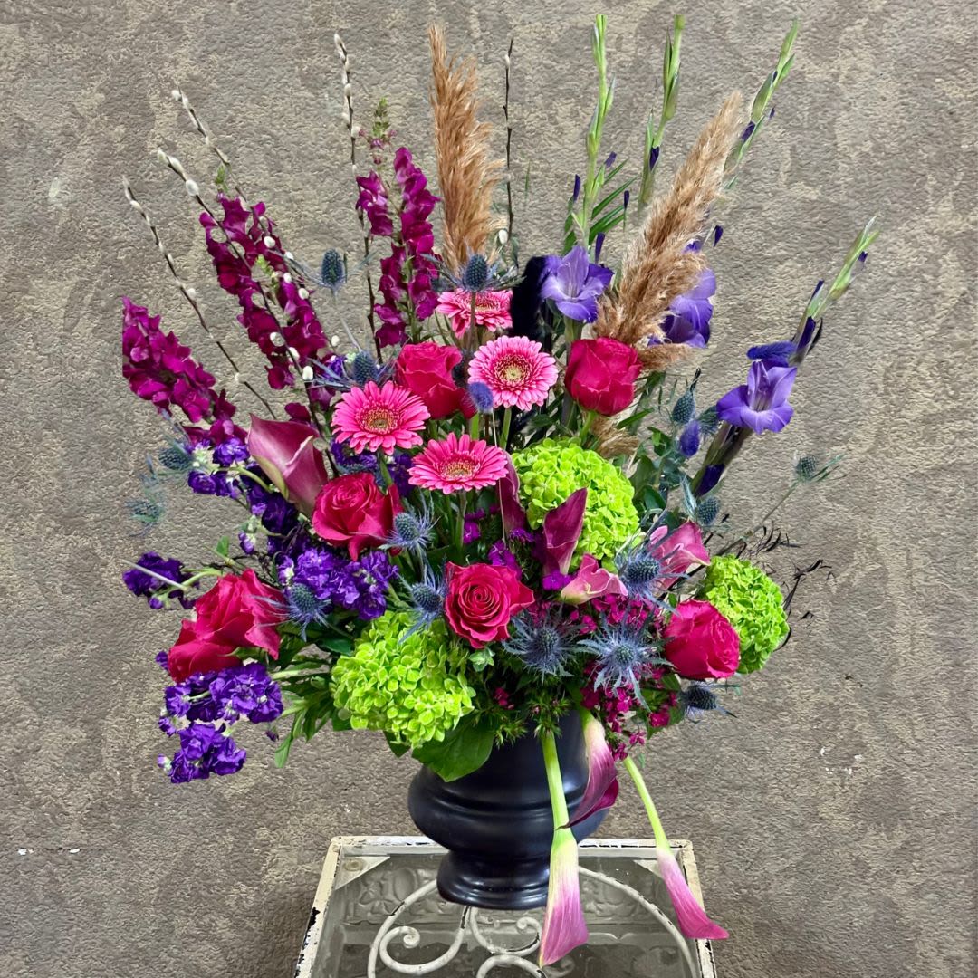 Goth Memorial Piece - Specially made for a Goth Memorial piece for the service with calla lilies, snapdragons, hydrangeas, larkspur, gerbera daisies, gladiolas, stock, pampas grass, and more accents in a black container. Please order 2-3 days in advance.