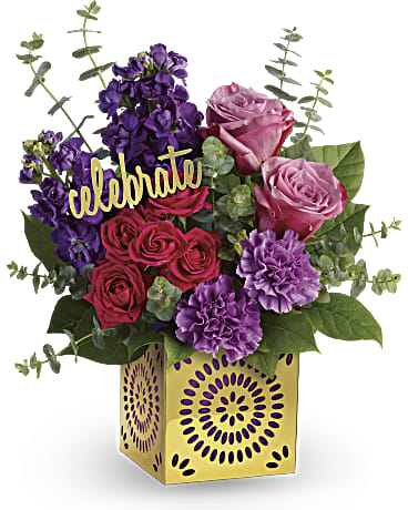 Pink and purple roses with carnations in a gold vase