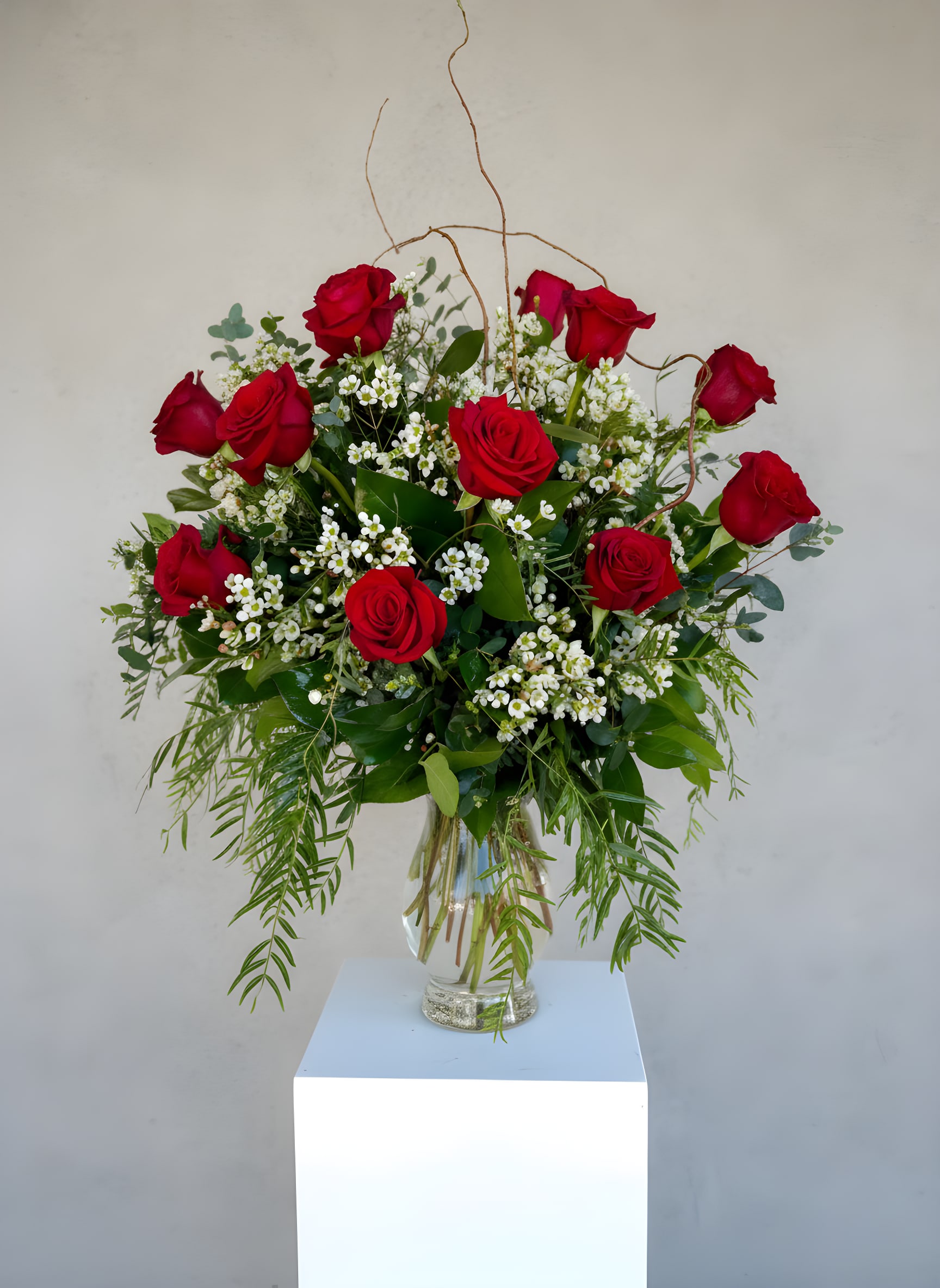 LF23 - 1, 2 or 3 Dozen Red Roses - 12, 24 or 36 Premium Red Roses in a glass vase, with greenery and pretty filler flowers.