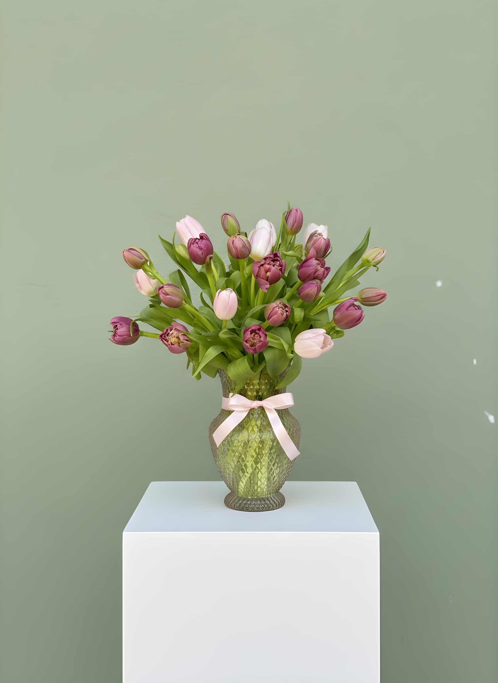 LF311 To My Tulip - Beautiful array of 20 dancing tulips, nestled in a beautiful light pink diamond cut vase . She will love it!!  Deluxe: 30 dancing tulips Premium:  40 dancing tulips Colors may vary.  Orientation:  All around  Approx Dim.  16"H x 12" W