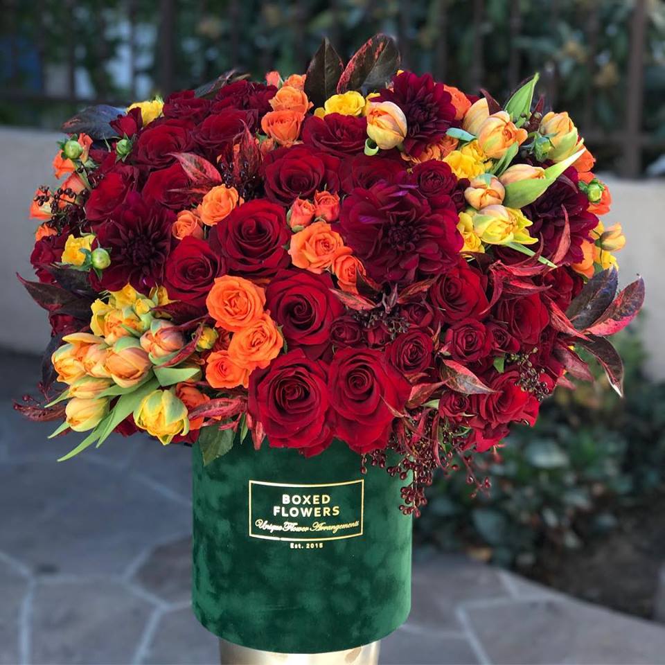 Signature emerald green box with fall bloom mix - This vibrant box is sure to brighten up anyone's day. Happy and romantic colors at the same time make this arrangement stand out.   Pictured: DELUXE