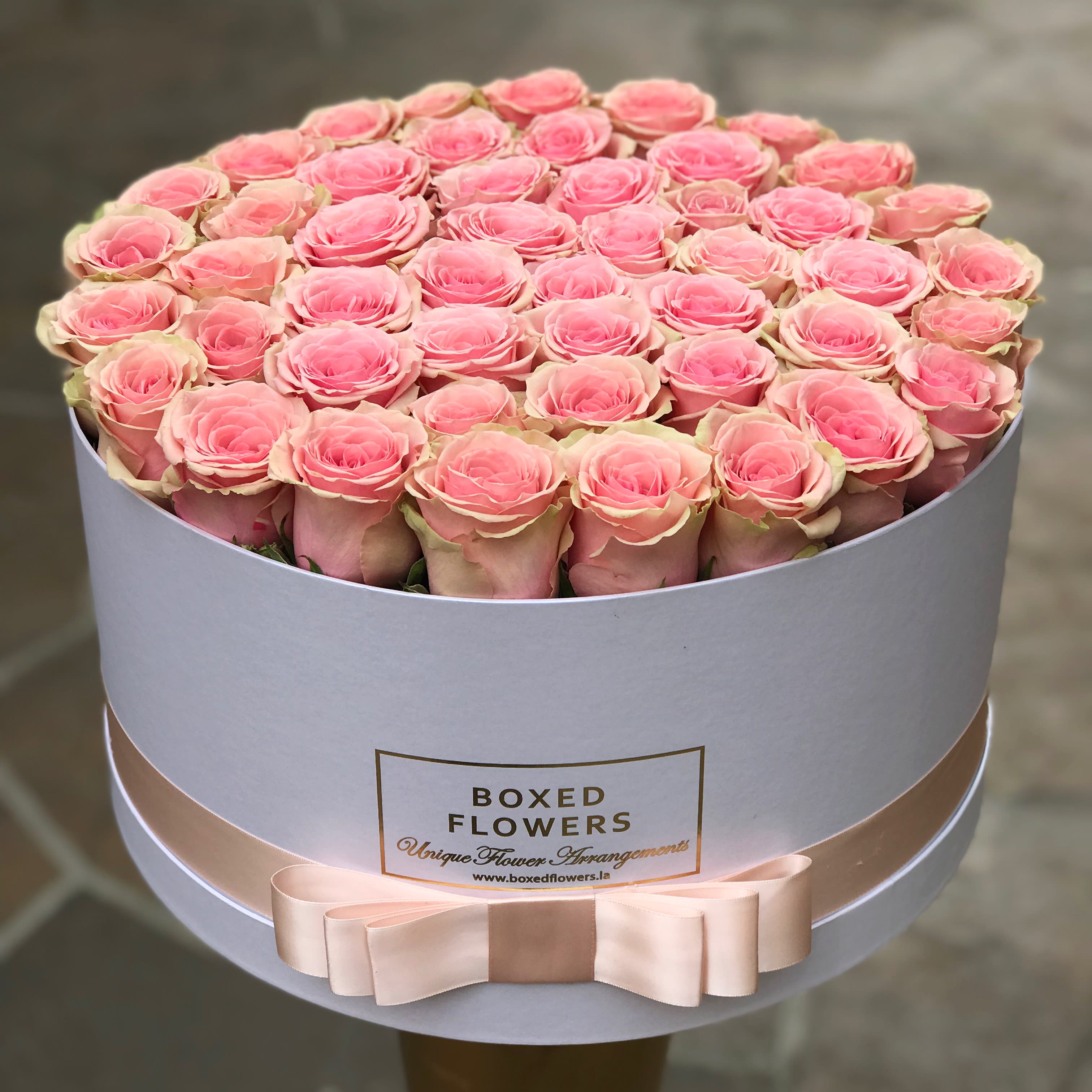 Signature matte white box with 50 roses - Elegance and style is what this box is all about. Choose your rose color at in the special instructions section at checkout.