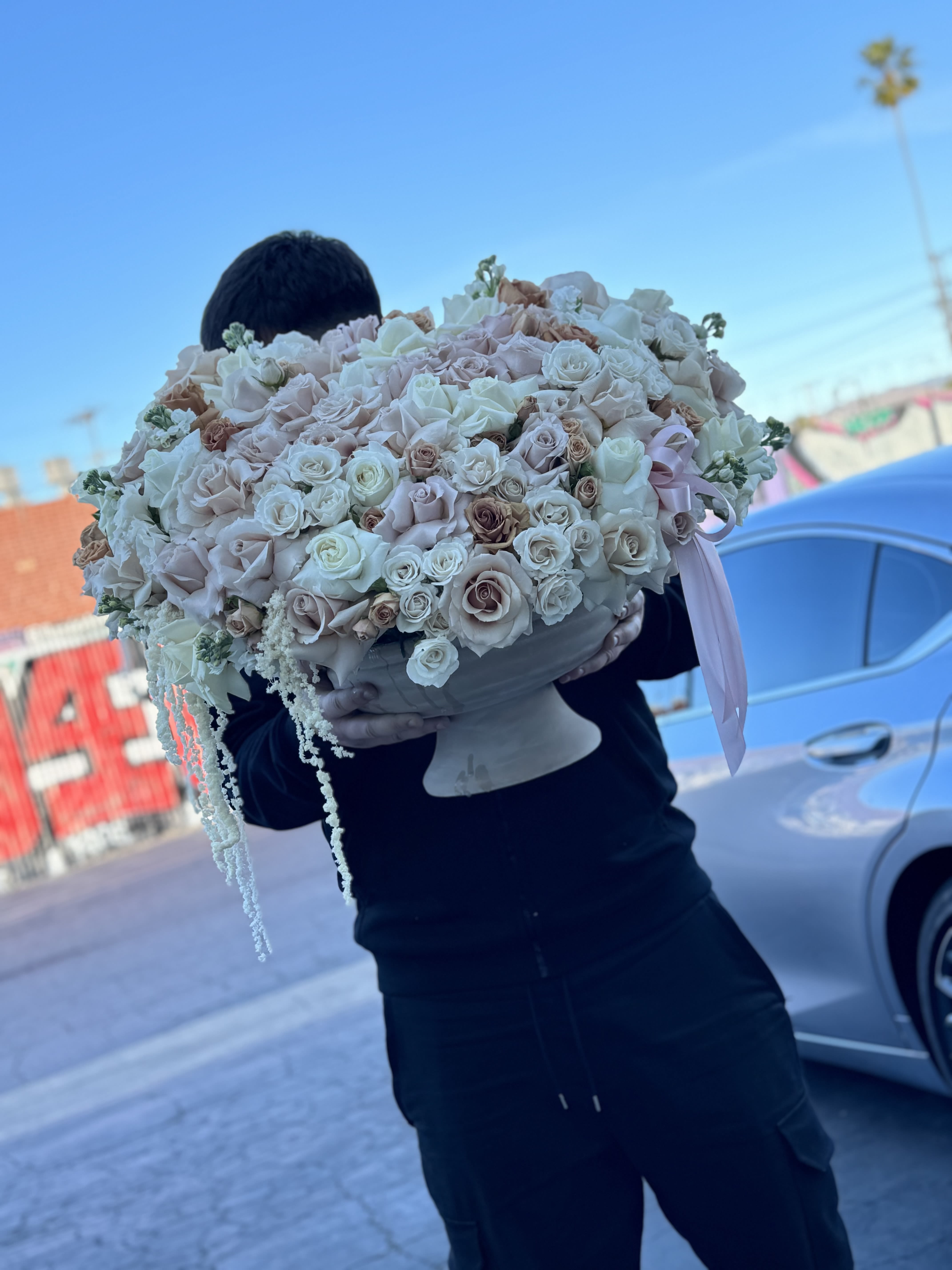 The neutral rose queen  - Beautiful combination of quicksand roses and toffee roses combined with some dripping white amaranthys. 
