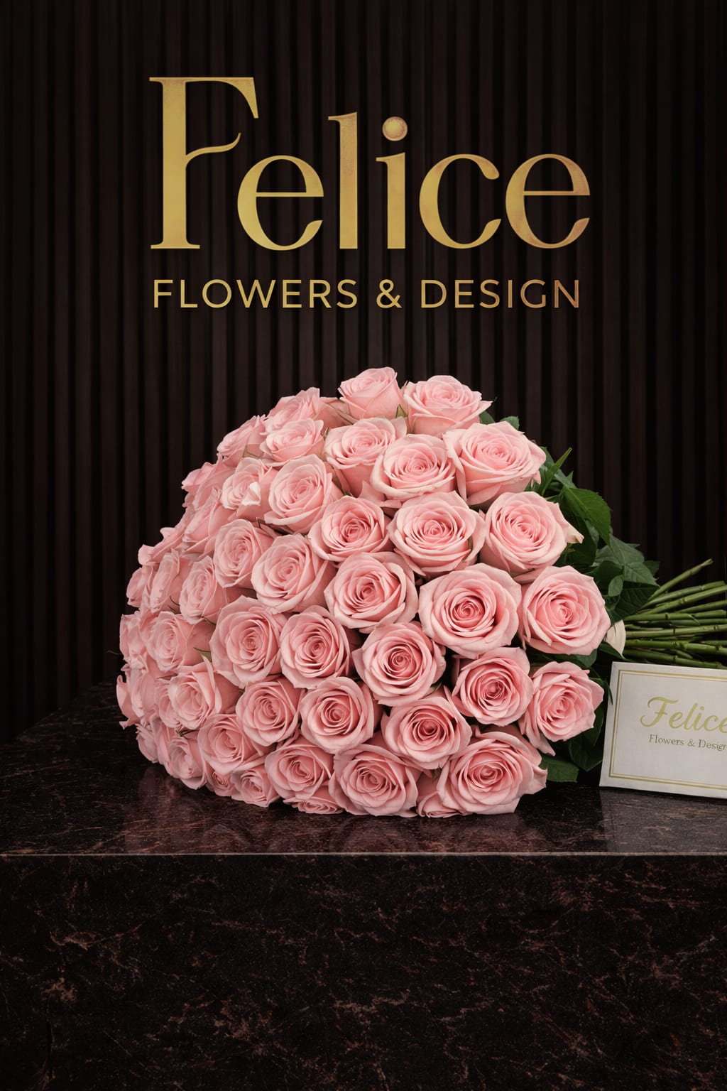 Large bouquet of pale pink roses on a dark surface
