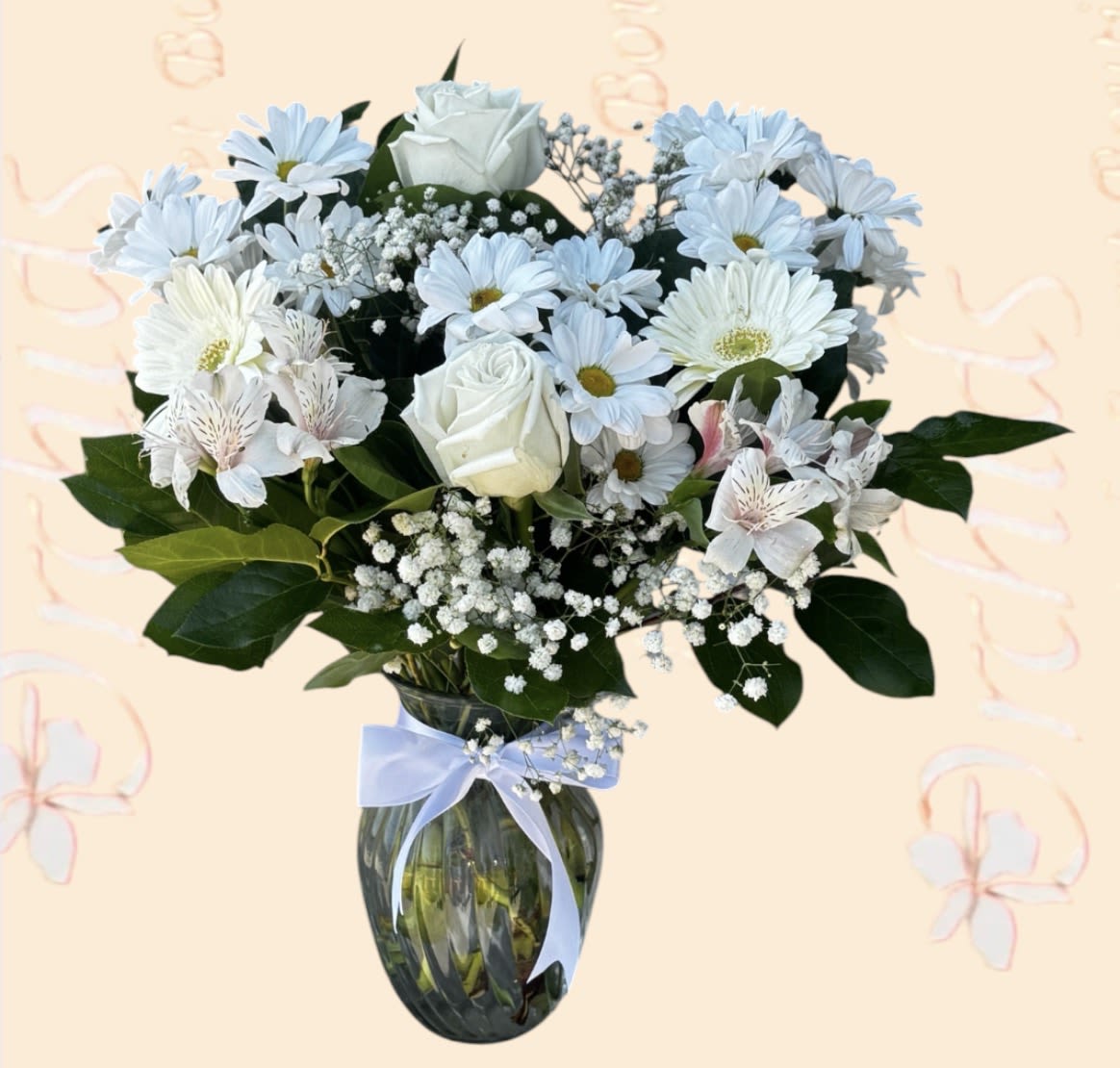 Brilliant White Roses Gerbera Daisy Bouquet | Same-Day Orange County Flower Delivery - Bring a touch of elegance and serenity with this stunning white floral arrangement featuring premium white roses, white daisies, gerbera daisies, alstroemeria, baby's breath, and lush greenery beautifully arranged in a clear glass vase with a satin ribbon! Perfect for birthdays, anniversaries, sympathy, get well wishes, new baby celebrations, or simply letting someone know you care. Inspired by timeless garden beauty, this fresh bouquet creates a sophisticated and peaceful impression for any occasion.  Same-Day Flower Delivery Available in Fullerton, Brea, Yorba Linda, Placentia, Anaheim, Orange, and surrounding Orange County cities. Our expert florists handcraft each arrangement using the freshest flowers available to ensure a beautiful presentation and long-lasting enjoyment.  