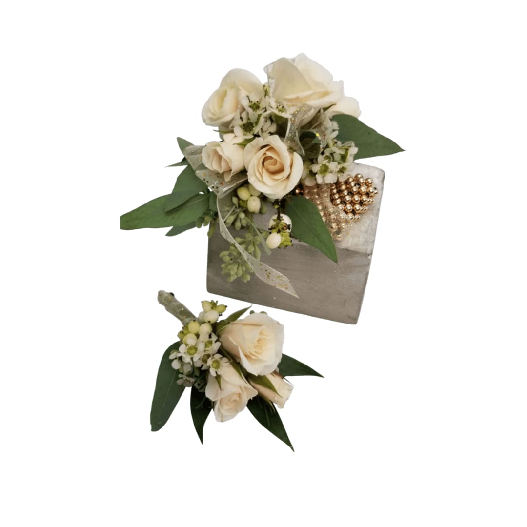 Cream rose bouquet with greenery and a matching boutonniere