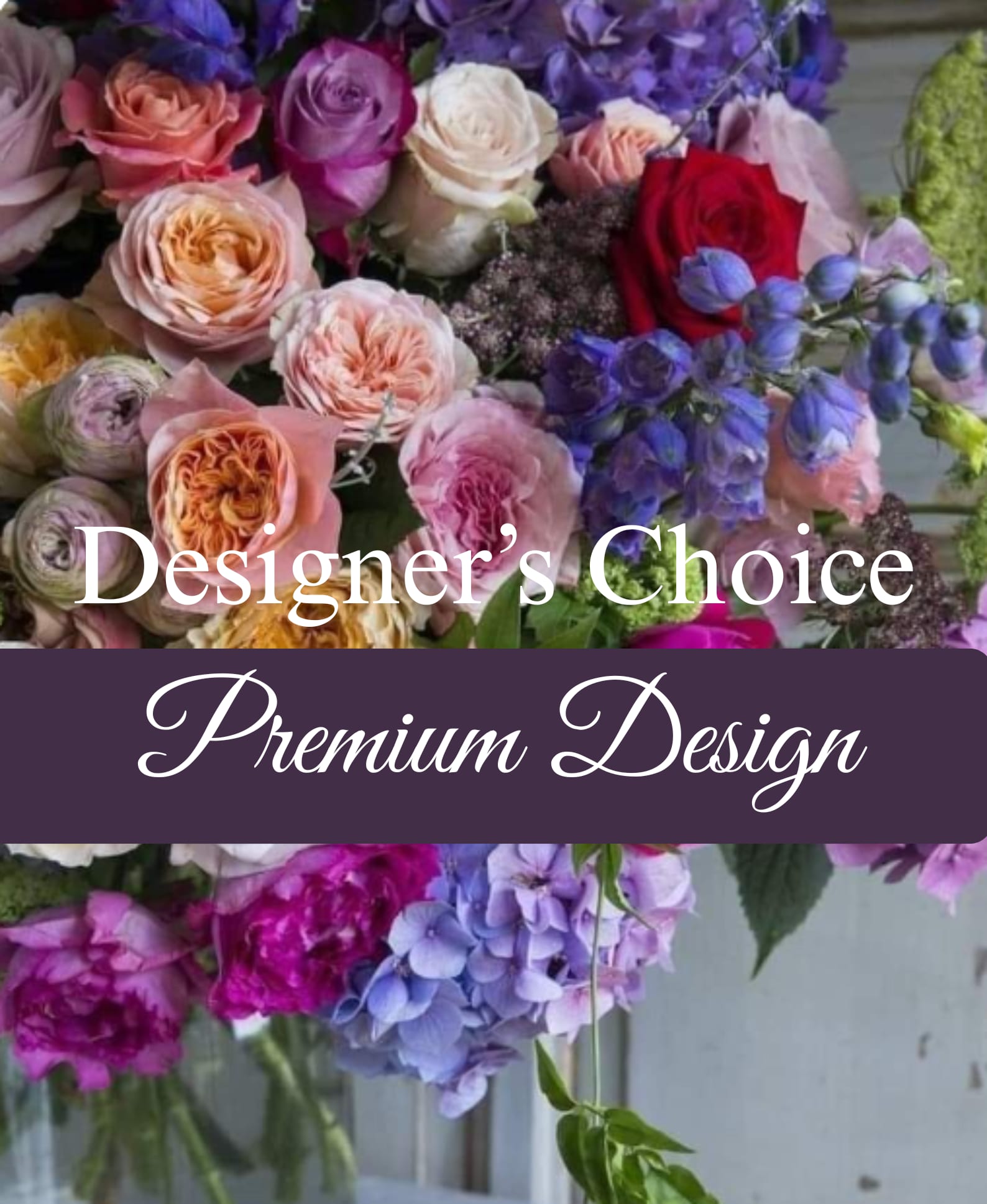 Mixed bouquet of roses and purple flowers with "Designer's Choice" text