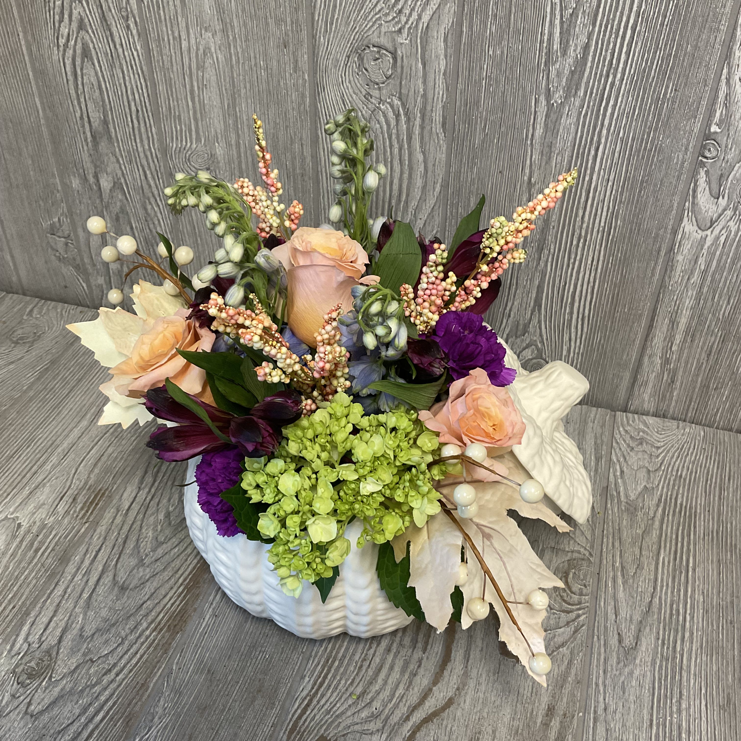 Fairytale Pumpkin - Beautiful fresh cut flowers, arranged in a ceramic pumpkin container with a lid. Flowers and colors may vary. 