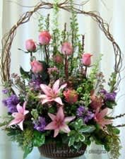 Kindhearted Basket - Basket filled with pink and lavender flowers, very gardeny