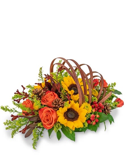 Basket arrangement with orange roses and yellow sunflowers