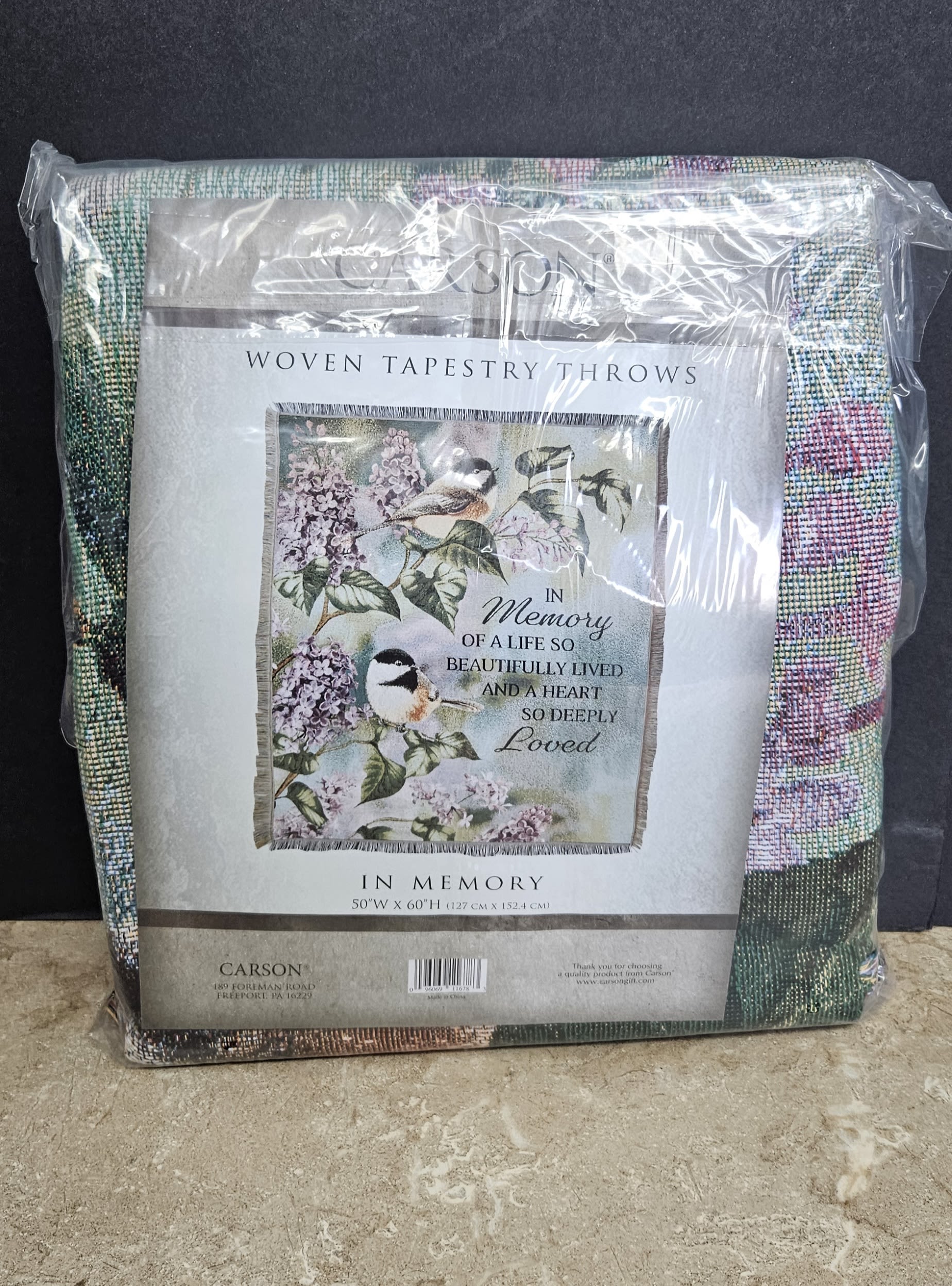Packaged memorial tapestry throw with birds and flowers