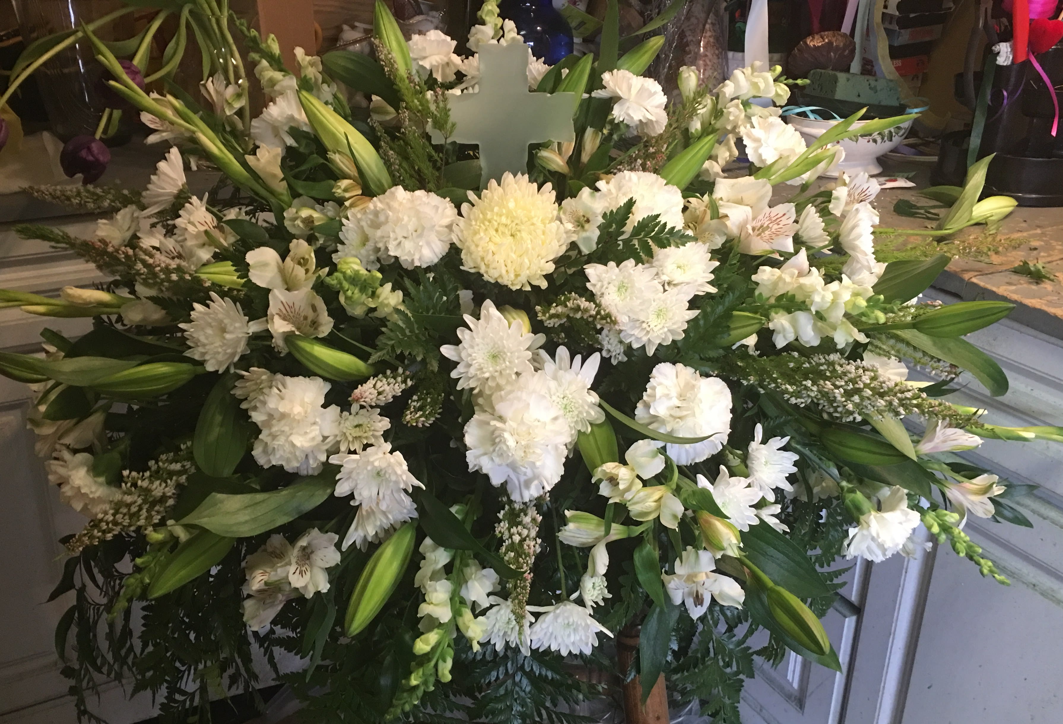 Large white floral spray with lilies and chrysanthemums