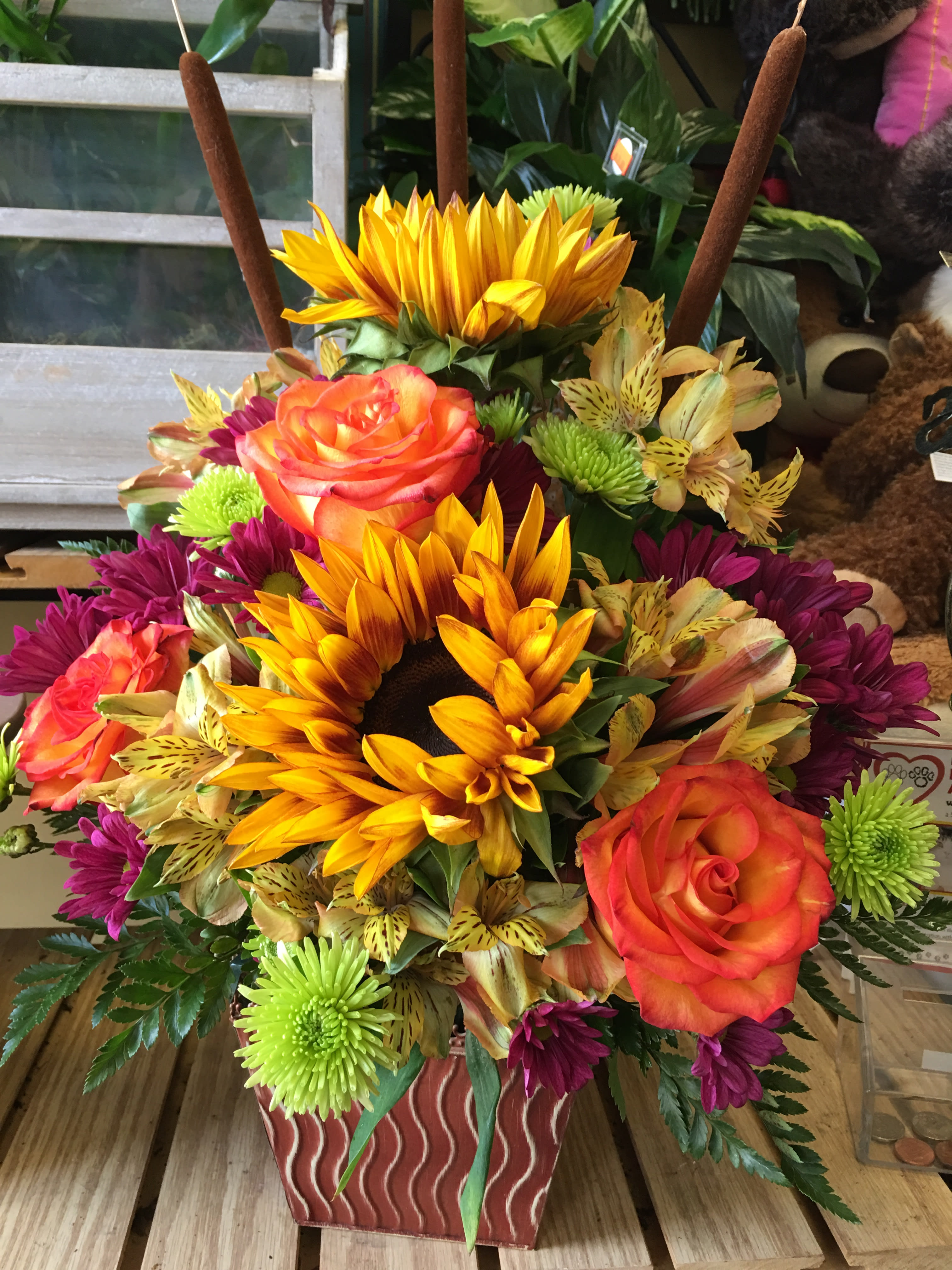 Expressions of Fall - Bring a bright touch to this glorious season with a chic fall bouquet in one of our  stylish containers. 