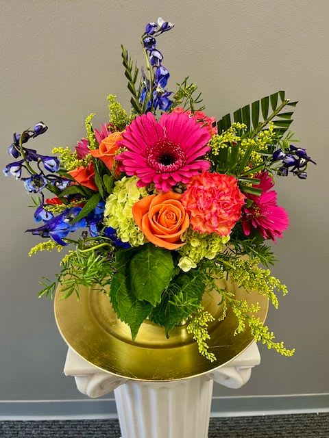 Calypso Melody - A moment in the tropics is what the colors in this design will bring you! Bright pink, orange, yellow, and deep blue are the vibrant colors that are sure to brighten the recipients day! 