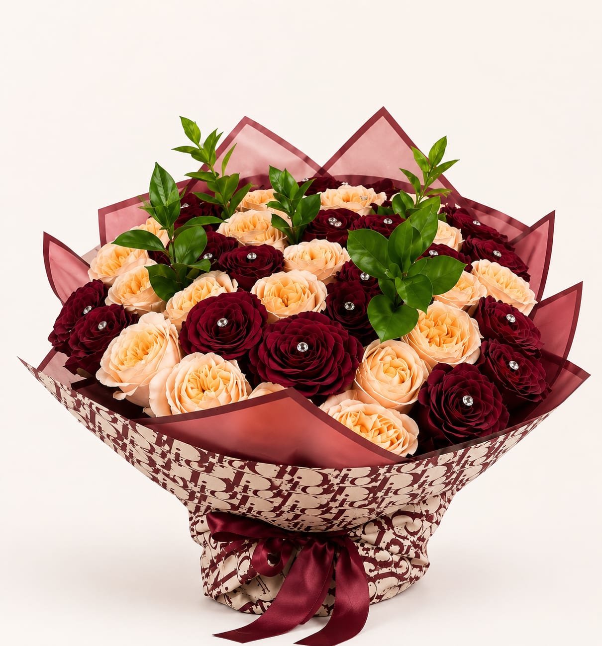 Red and Peach Rose Bouquet - A lavish couture bouquet where deep velvet crimson roses entwine with soft tiffany blooms, creating a composition that feels like a whispered promise beneath candlelight. Every petal carries the mood of an intimate ballroom- warm reflections, satin textures, and quiet luxury.