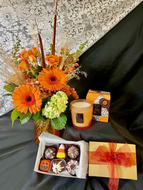 Fall Gift Set - A gorgeous vase of fall toned flowers accompanied by 6 truffles and a Voluspa Spiced Pumpkin Latte 9oz. candle.