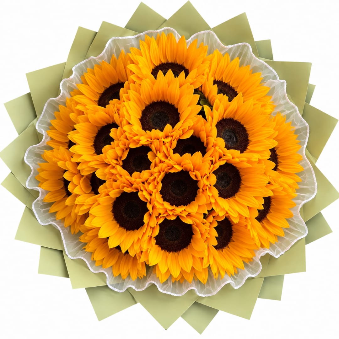 Bouquet of bright yellow sunflowers wrapped in pale green paper