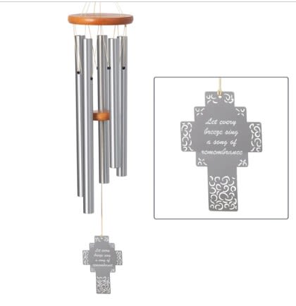 Silver wind chime with a cross-shaped hanging tag