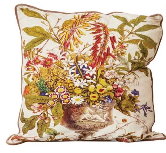 Decorative floral-print throw pillow with a vase of flowers
