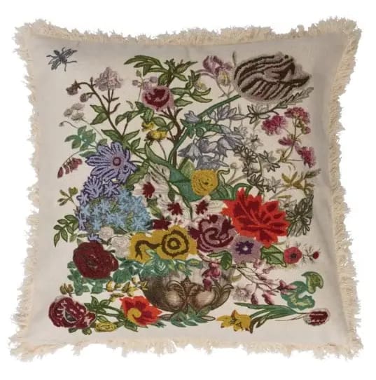Embroidered floral pillow with fringe trim