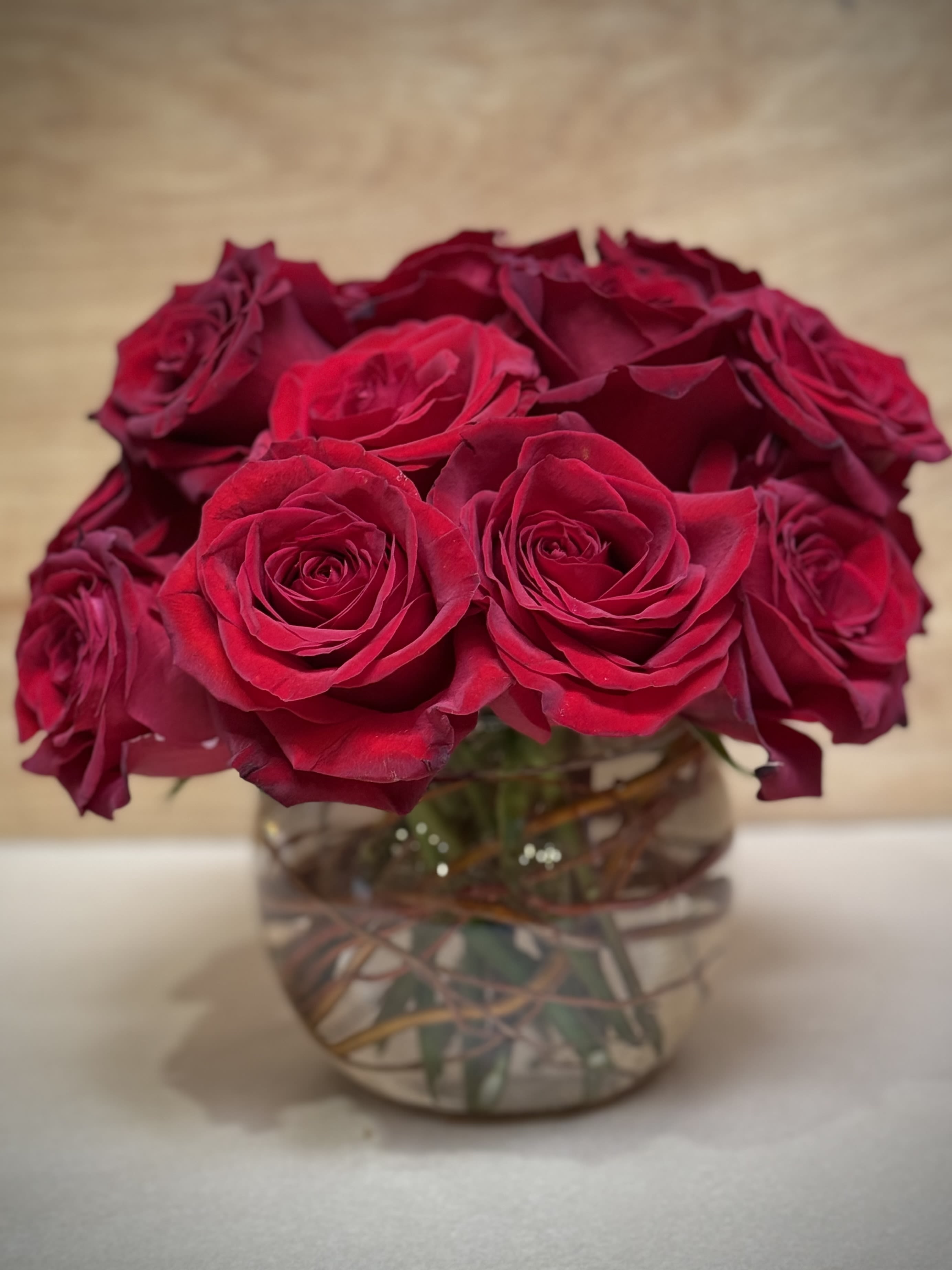 Rose Romance - 15 red roses exquisitely arranged in a 6" bubble bowl.. Height: Approximately 10" 