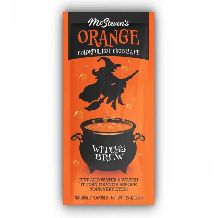 Orange hot chocolate mix packet with a witch graphic