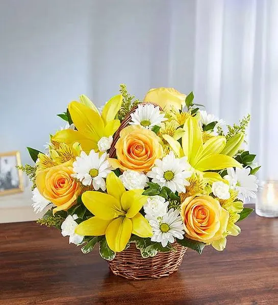 Peace  &amp; Blessings Yellow &amp; White  basket - A gesture of light, hope and optimism during a dark time can be all someone needs to brighten their day. Our sunny yellow and white arrangement, artistically designed inside a keepsake willow basket, is a touching way to convey your support and sincerest blessings.