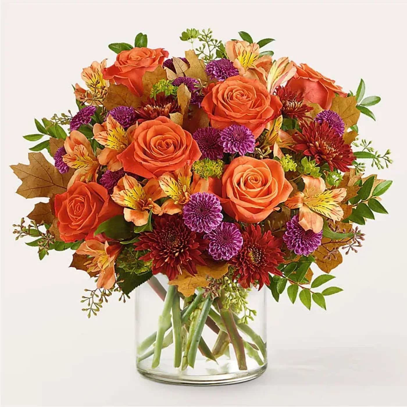 Orange You Glad Bouquet - Crack a smile with the Orange You Glad Bouquet, a harmonious balance of orange and purple florals.