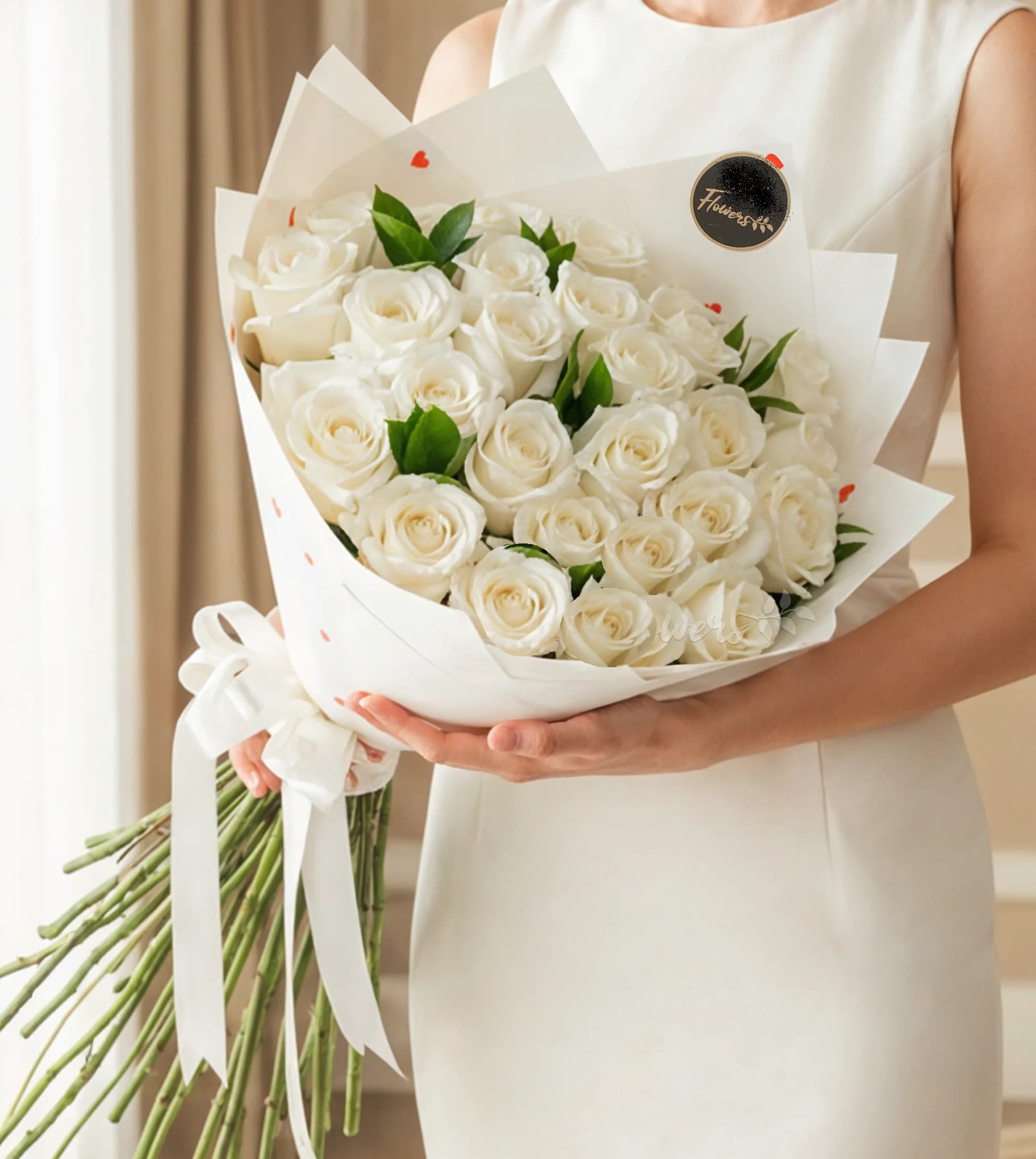 Bouquet of white roses wrapped in white paper