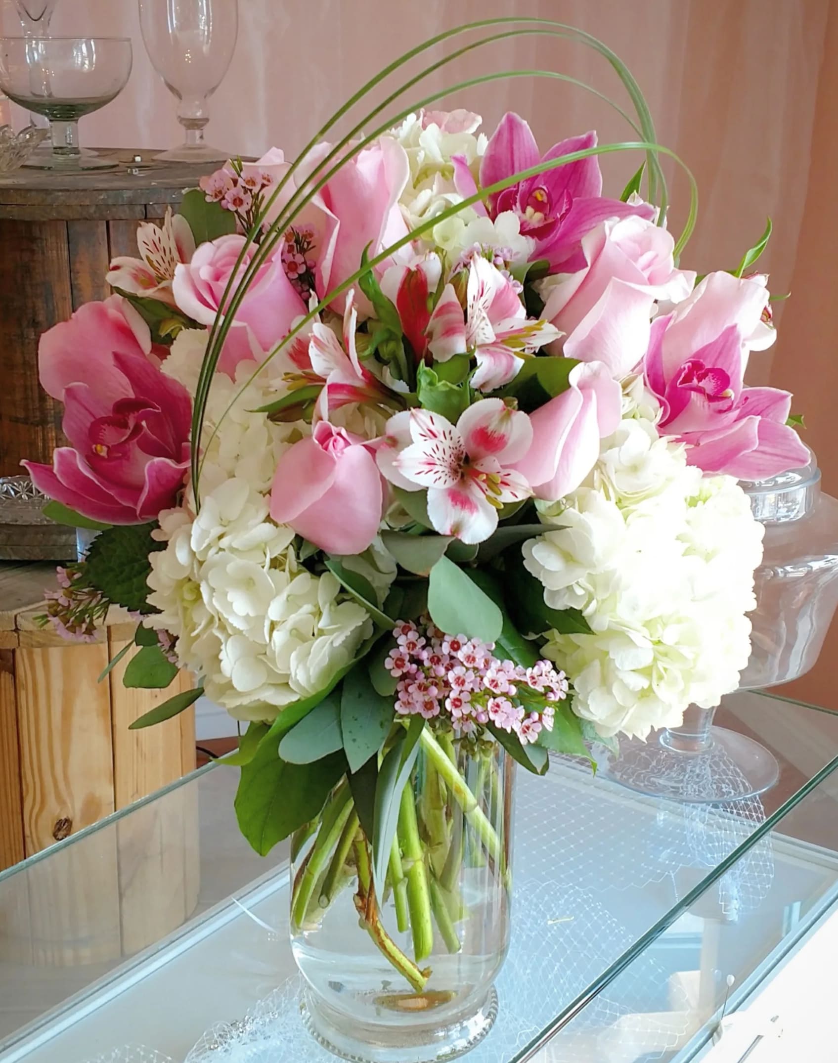 Pink and white mixed bouquet in a clear glass vase
