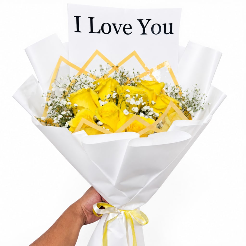 Yellow rose bouquet wrapped in white paper with an "I Love You" card