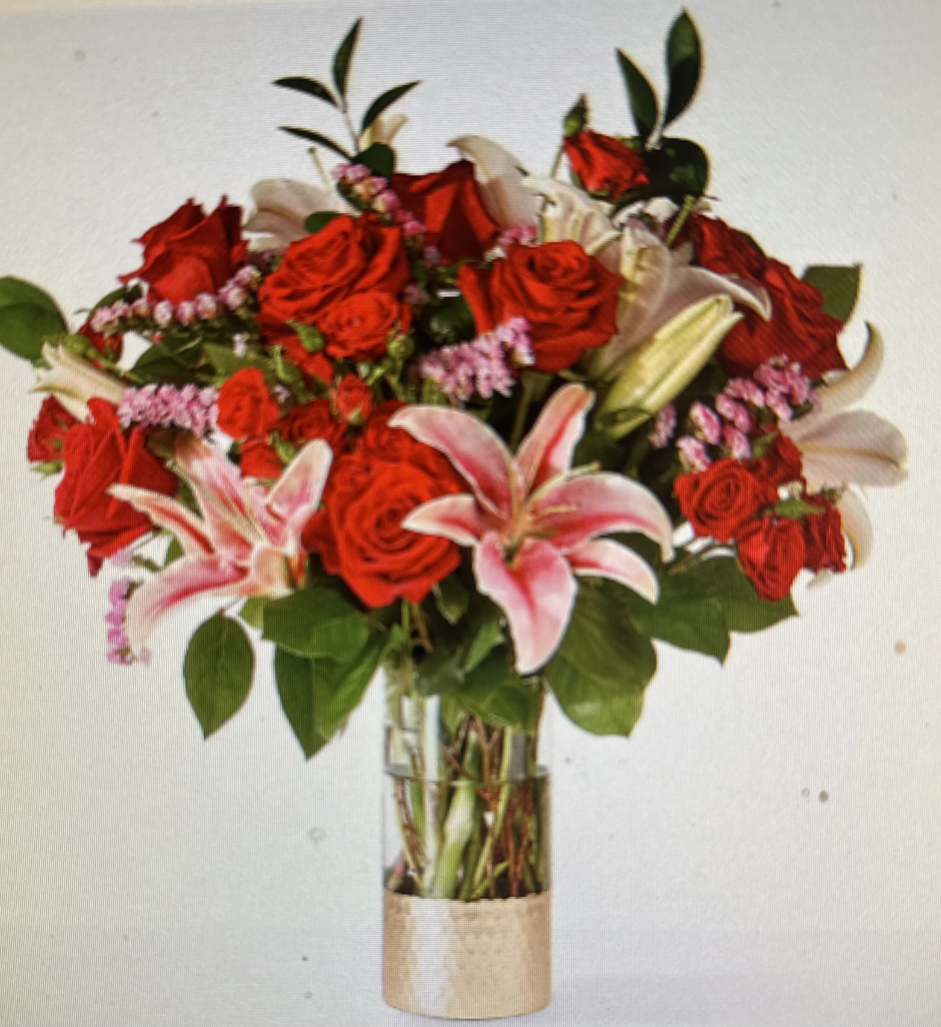 TO THE MOON BOUQUET - STUNING BOUQUET OF STARGAZER LILLIES, RED ROSES, RED SPRAY ROSES WITH FILLERS IN A STUNNING GOLD DIPPED VASE