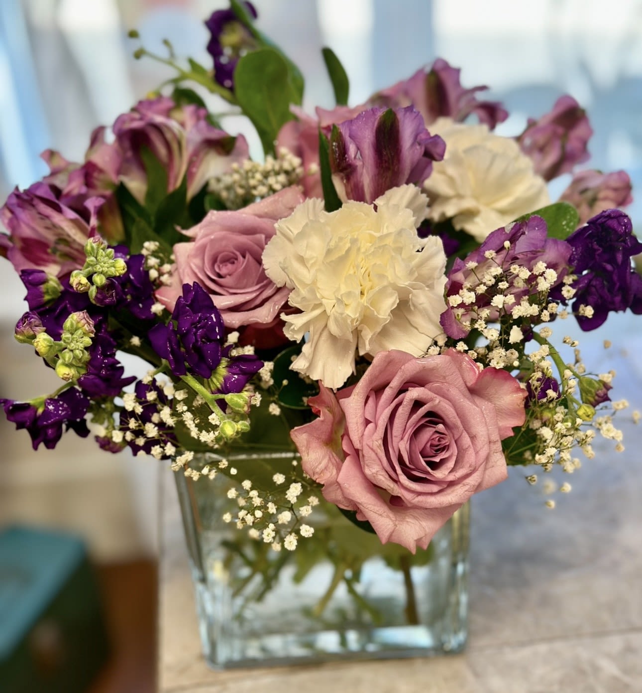 PURPLE PEACE CUBE BOUQUET - LOVELY CUBE OF PURPLE ALSTROMERIA, CARNATIONS, STOCK, BABIES BREATH, GREENS. BEAUTIFUL PRESENTATION!