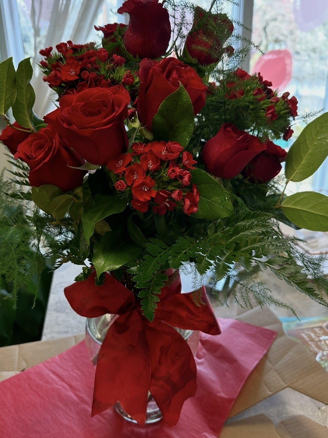 SULTRY LOVE BOUQUET - SULTRY MIX OF DARK PASSIONATE FLOWERS. 12 DARK RED ROSES DARK SWEET WILLIAM WITH GREENS! SURE TO CONVEY THE MOOD!!! BOW MAY VARY