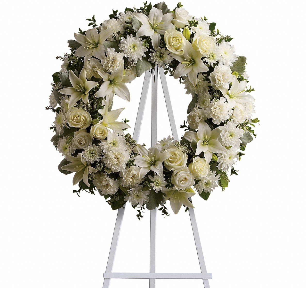 White floral wreath on a standing easel