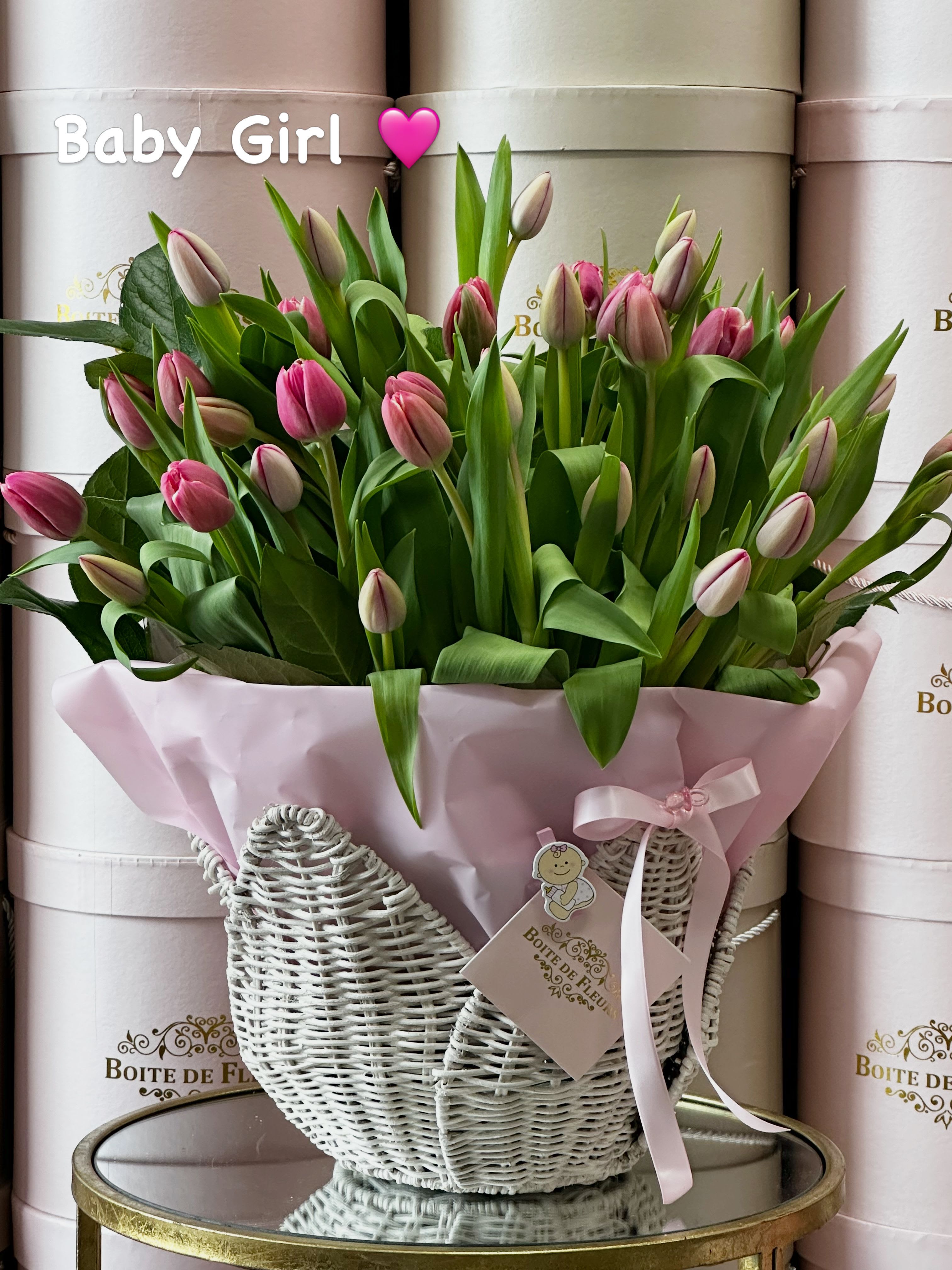 BELLE - Pink tulips in a flower basket with baby girl accents.