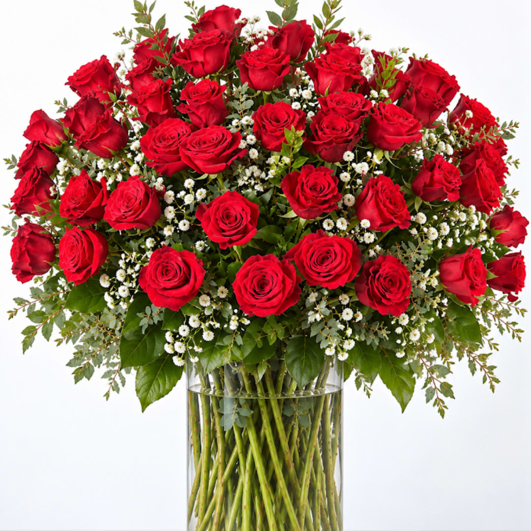 Bouquet of red roses in a clear glass vase