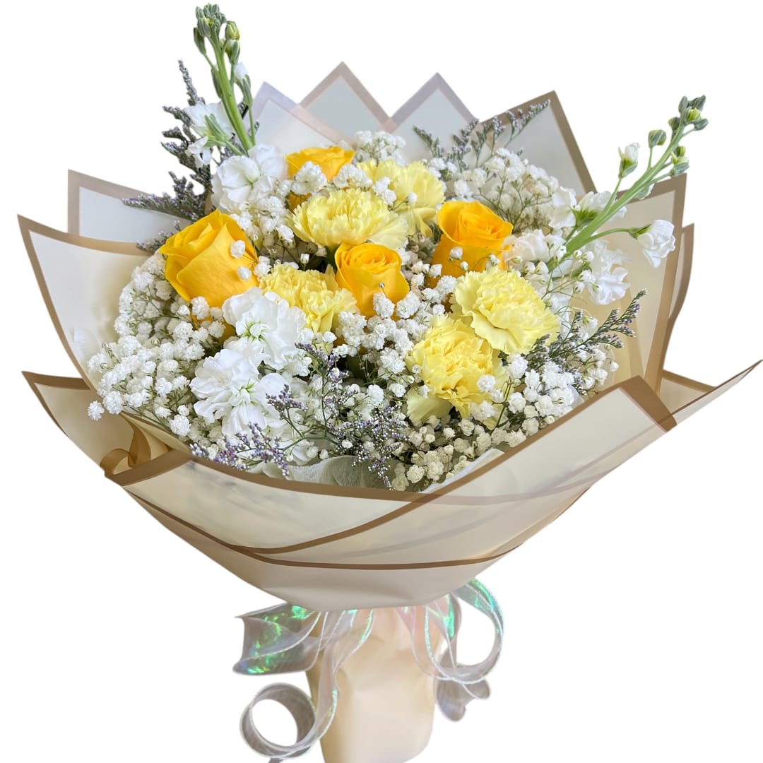 Yellow roses and white carnations in a wrapped bouquet