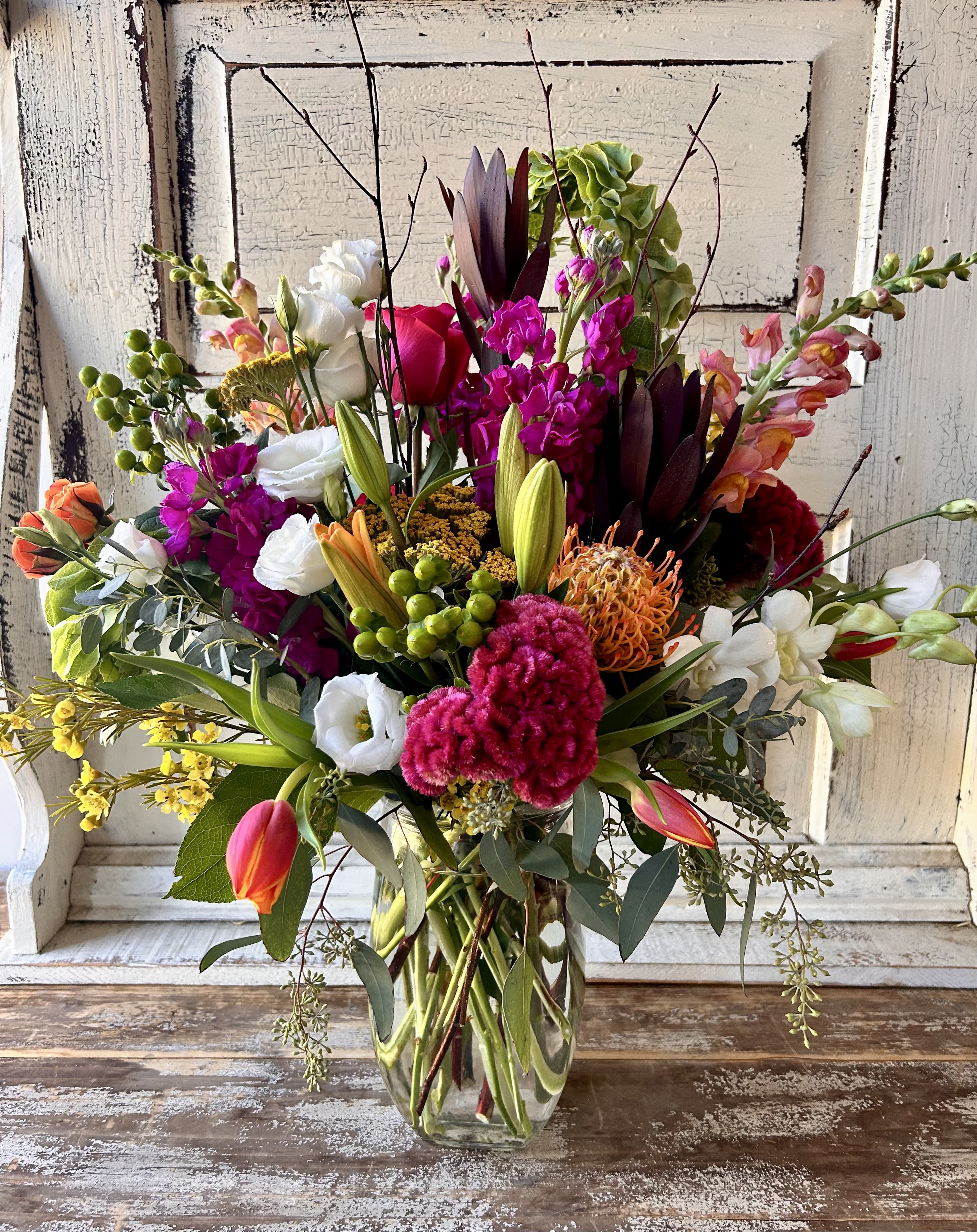 Mixed Seasonal Vase  - Let our designers select the perfect assortment of fresh flowers and foliage from our cooler to make a beautiful statement from you for any occasion. Flowers and colors will vary weekly.