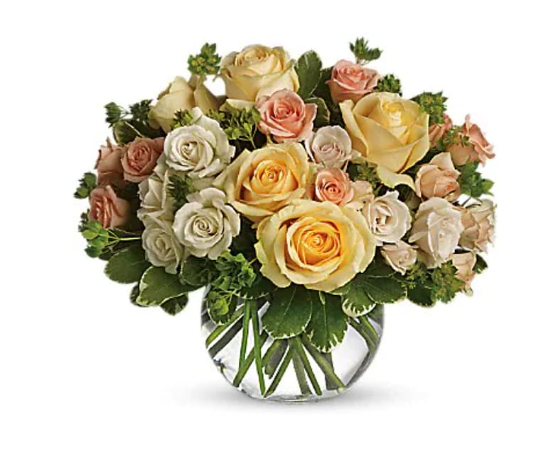 This Magic Moment - It will be a magic moment when this divine bowl of pastel roses is hand-delivered to someone special. Perfect for any occasion, the soft colors and variety of rose blossoms will soothe anyone's soul. Beautiful yellow roses, peach and white spray roses and greens are delivered in a clear glass bubble ball. The effect is magical.   Orientation : All-Around  All prices in USD ($) 