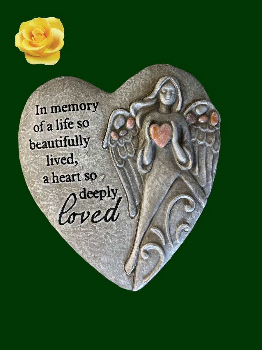 Heart-shaped memorial plaque with an angel and a yellow rose